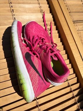 Nike Women's Bright Pink Athletic Running Sneakers with Black Swoosh